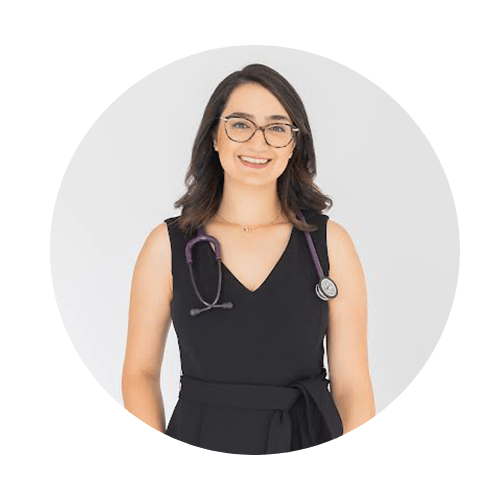 Smiling healthcare professional with stethoscope.